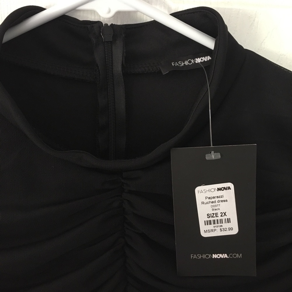 Black long sleeve ruched dress